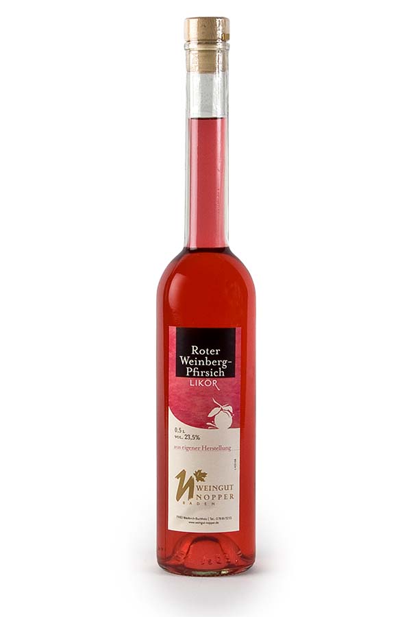 Roter Weinbergpfirsichlikör auf reifen Früchten